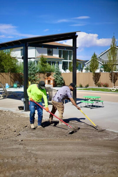 Raking topsoil Tall